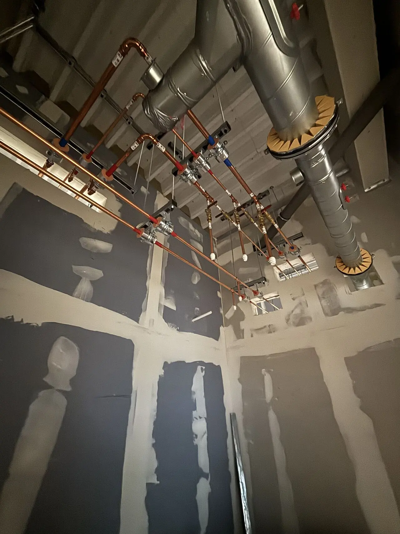 Copper pipework next to ventilation ducting: commercial plumbing in Nottingham