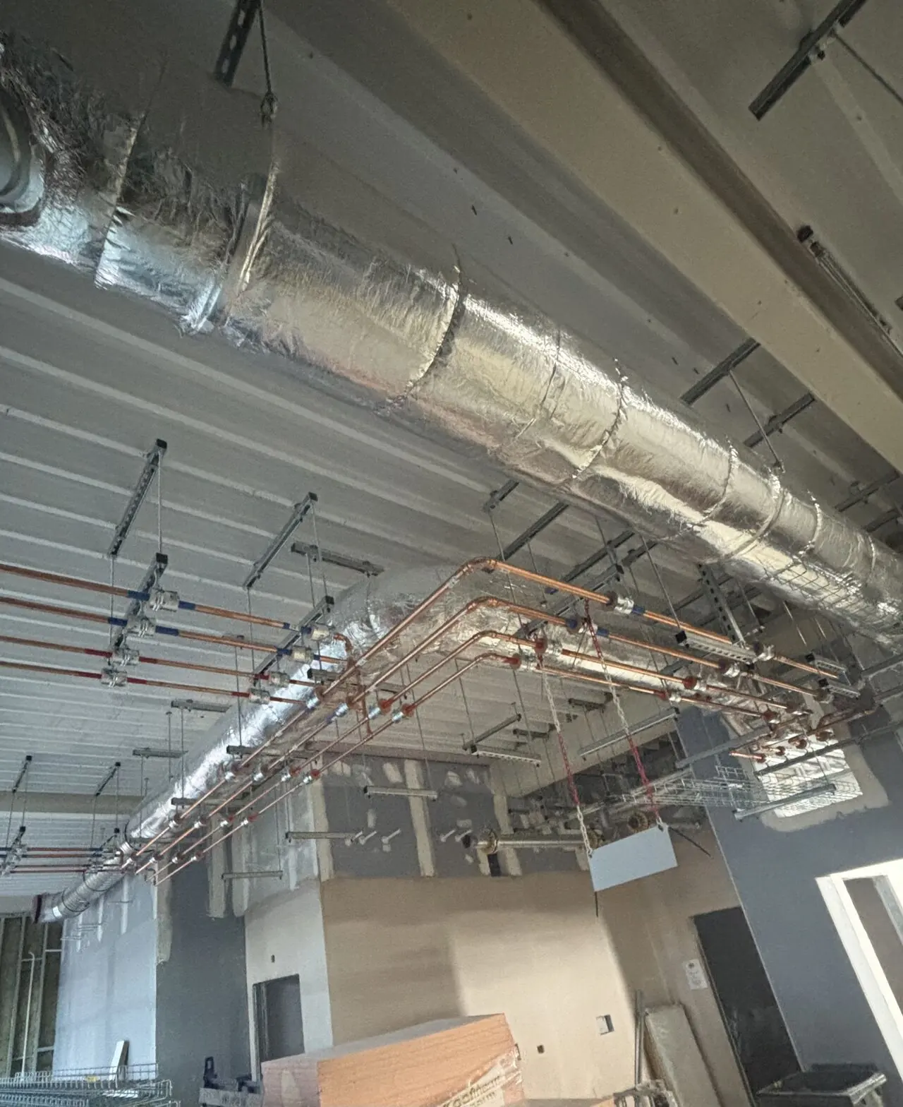 Insulated ducting and copper pipework installed for commercial plumbing in Retford